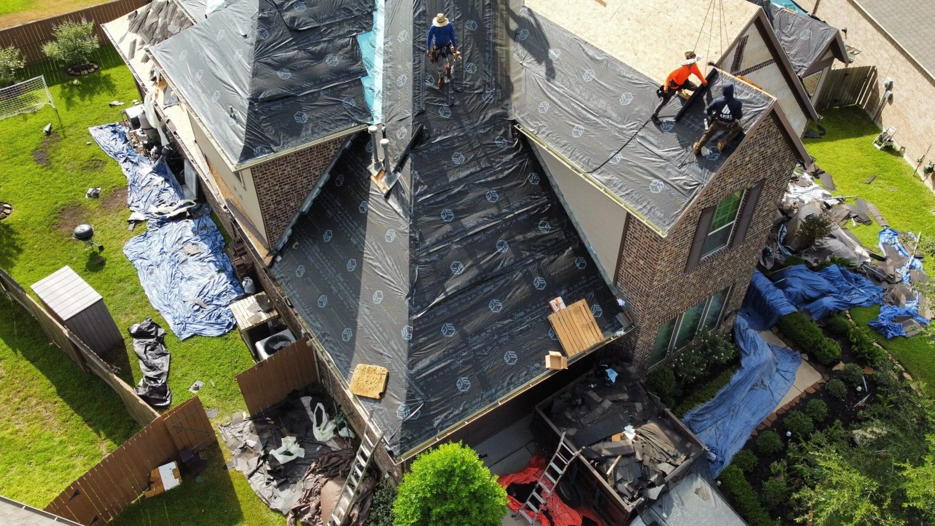 Aerial view of an SB Restorations roofing project in Katy